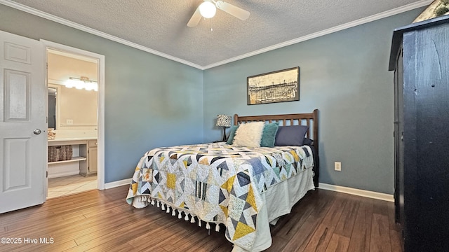 bedroom featuring baseboards, hardwood / wood-style flooring, and a textured ceiling