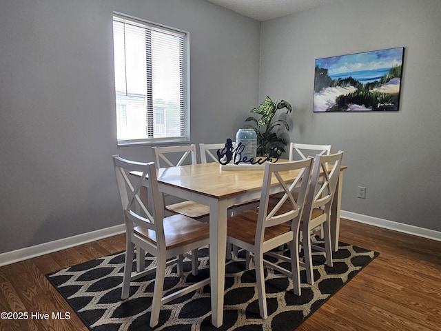 10172 Beach Dr SW Unit 2303, Calabash, NC 28467 - dining area featuring wood finished floors and baseboards