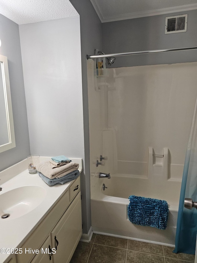 10172 Beach Dr SW Unit 2303, Calabash, NC 28467 - full bath featuring vanity, tub / shower combination, tile patterned flooring, and crown molding
