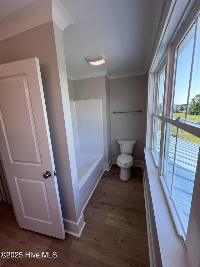 3216 Whichards Beach Rd, Chocowinity, NC 27817 - bathroom with plenty of natural light, toilet, a bath, ornamental molding, and baseboards