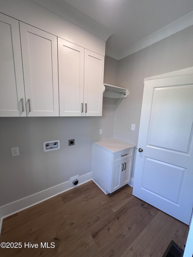 3216 Whichards Beach Rd, Chocowinity, NC 27817 - washroom with electric dryer hookup, cabinet space, washer hookup, dark wood finished floors, and baseboards