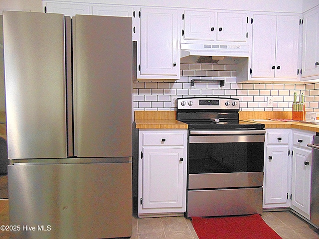 kitchen with white cabinets, light countertops, under cabinet range hood, and stainless steel appliances