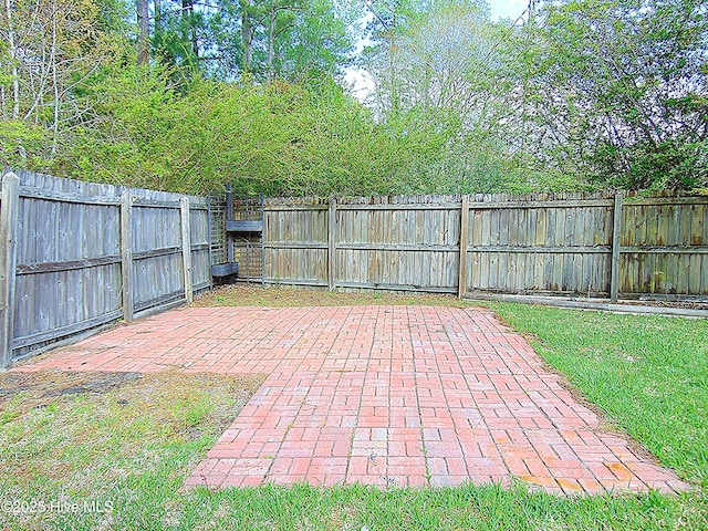 view of patio featuring a fenced backyard