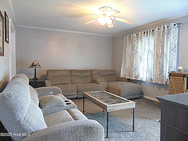 living room with baseboards, carpet floors, ornamental molding, and ceiling fan