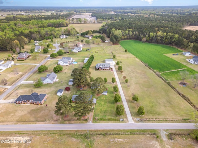 drone / aerial view with a forest view