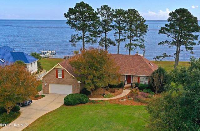 6042 Dolphin Rd, Oriental, NC 28571 - view of front of property featuring a water view, driveway, a front yard, and brick siding