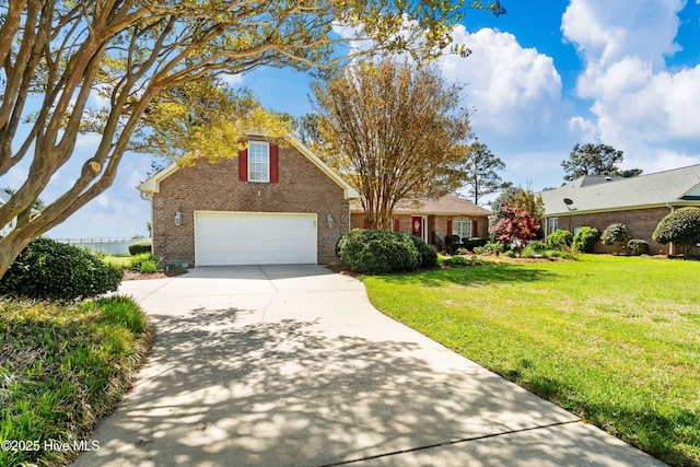 6042 Dolphin Rd, Oriental, NC 28571 - traditional home with brick siding, concrete driveway, and a front yard