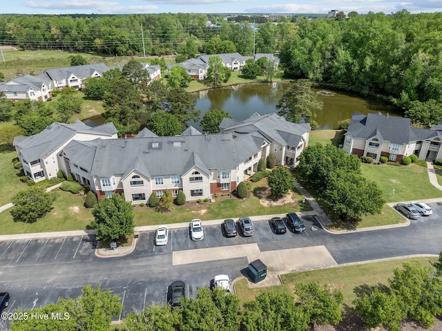 aerial view with a water view and a residential view