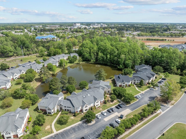 birds eye view of property featuring a water view and a residential view