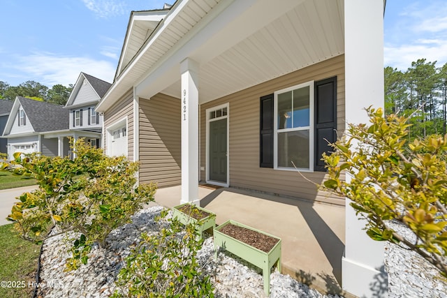 entrance to property with covered porch