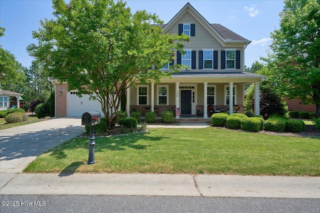 104 Old Club House Ln, Southern Pines, NC 28387 - view of front of property featuring an attached garage, a front lawn, a porch, and driveway