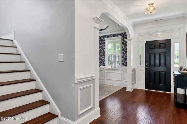 104 Old Club House Ln, Southern Pines, NC 28387 - foyer with a decorative wall, stairs, wood finished floors, visible vents, and ornamental molding