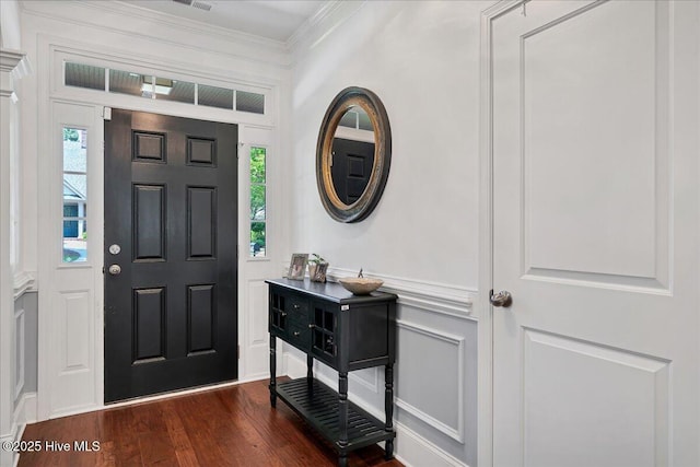 104 Old Club House Ln, Southern Pines, NC 28387 - foyer with crown molding, plenty of natural light, a decorative wall, and dark wood-style flooring