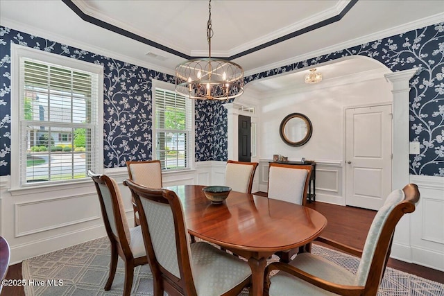 104 Old Club House Ln, Southern Pines, NC 28387 - dining space with an inviting chandelier, wainscoting, dark wood-style floors, and wallpapered walls