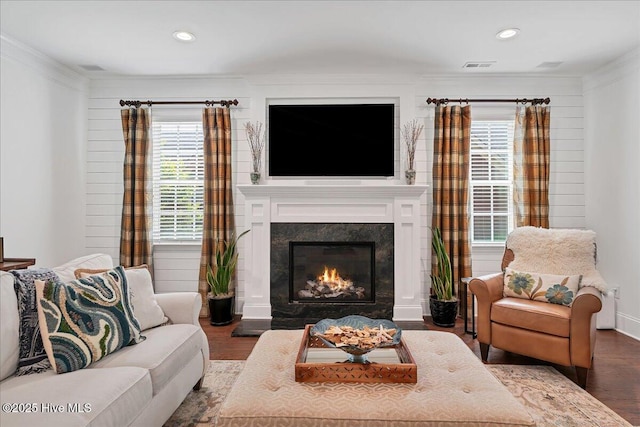 104 Old Club House Ln, Southern Pines, NC 28387 - living room with visible vents, a high end fireplace, wood finished floors, ornamental molding, and recessed lighting