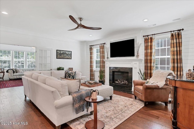 104 Old Club House Ln, Southern Pines, NC 28387 - living area featuring crown molding, ceiling fan, dark wood finished floors, and a premium fireplace