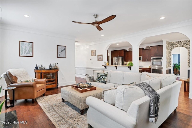 104 Old Club House Ln, Southern Pines, NC 28387 - living room featuring crown molding, arched walkways, and ceiling fan
