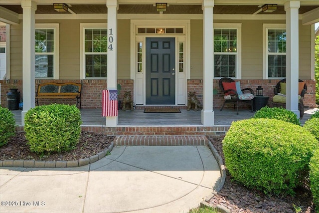 104 Old Club House Ln, Southern Pines, NC 28387 - property entrance with brick siding and covered porch