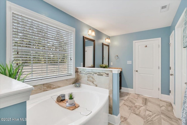 104 Old Club House Ln, Southern Pines, NC 28387 - bathroom with vanity, marble finish floor, baseboards, visible vents, and a bath