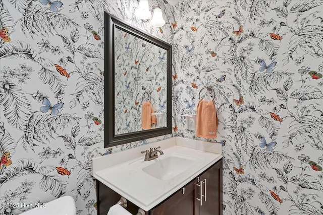 104 Old Club House Ln, Southern Pines, NC 28387 - bathroom featuring vanity, toilet, and wallpapered walls