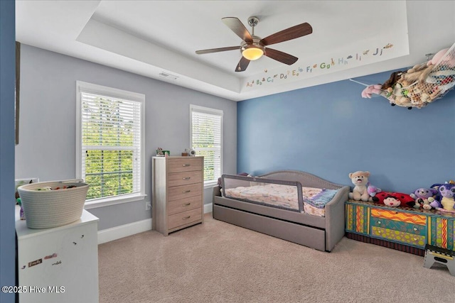 104 Old Club House Ln, Southern Pines, NC 28387 - bedroom featuring carpet, multiple windows, and a raised ceiling