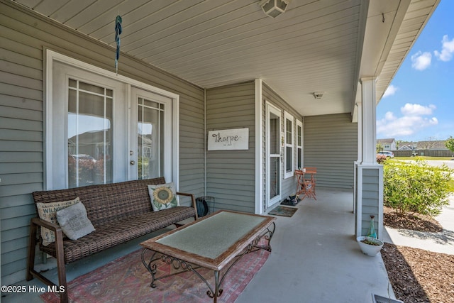 view of patio featuring a porch