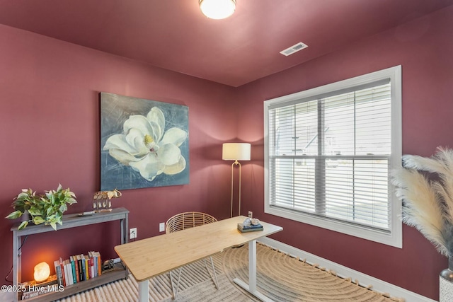 office with visible vents, a wealth of natural light, and baseboards