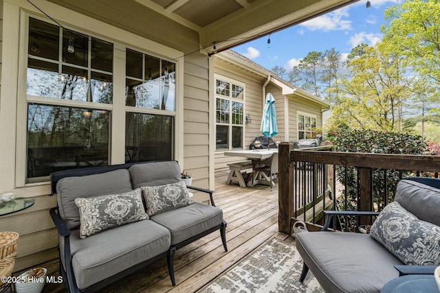 deck featuring an outdoor living space