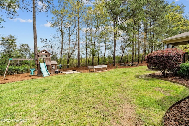 view of yard with a playground