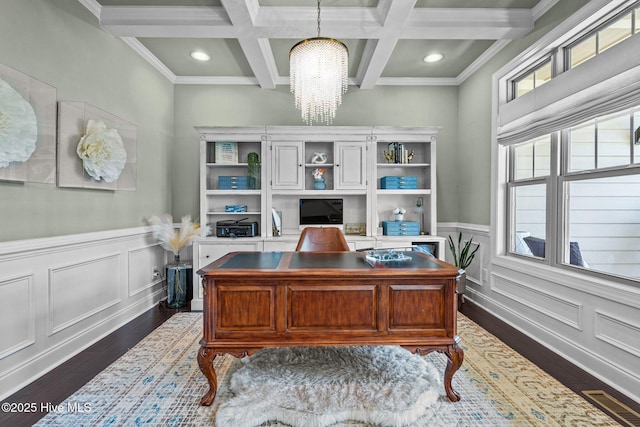 office space with a healthy amount of sunlight, a notable chandelier, beam ceiling, and dark wood-style floors