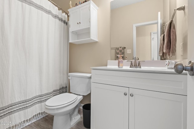 full bath with vanity and toilet