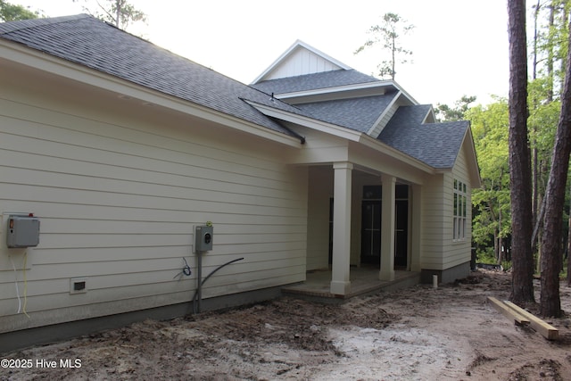 3359 Portside Dr SW, Supply, NC 28462 - view of side of property featuring a shingled roof