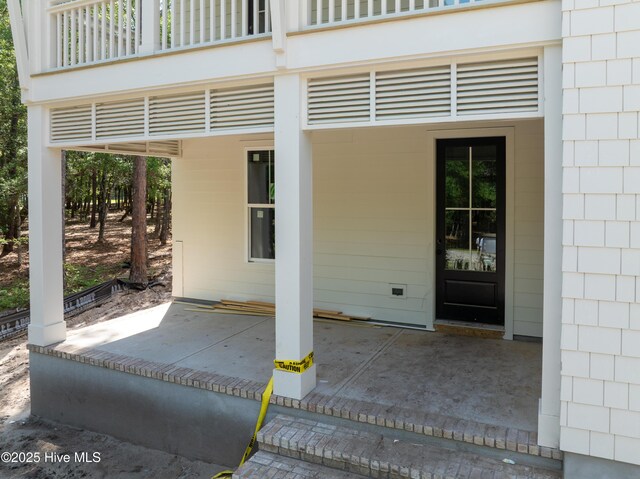 3359 Portside Dr SW, Supply, NC 28462 - doorway to property featuring a patio