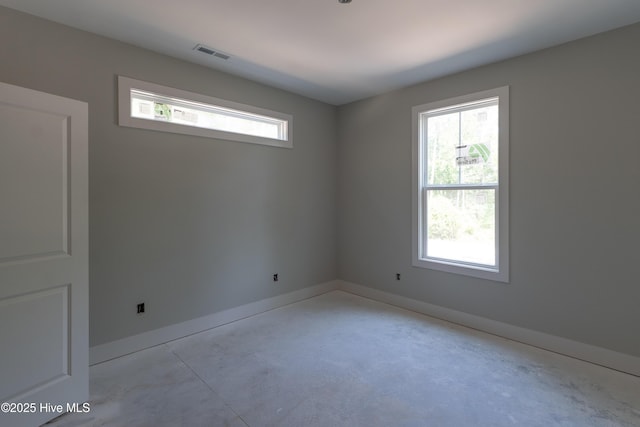 3359 Portside Dr SW, Supply, NC 28462 - unfurnished room featuring concrete floors, healthy amount of natural light, and baseboards