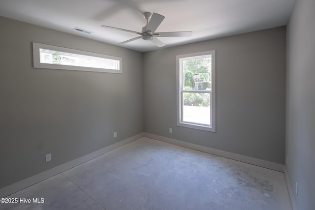3359 Portside Dr SW, Supply, NC 28462 - empty room with concrete floors and a ceiling fan