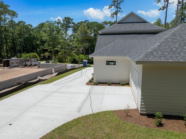 3359 Portside Dr SW, Supply, NC 28462 - view of side of property with a shingled roof