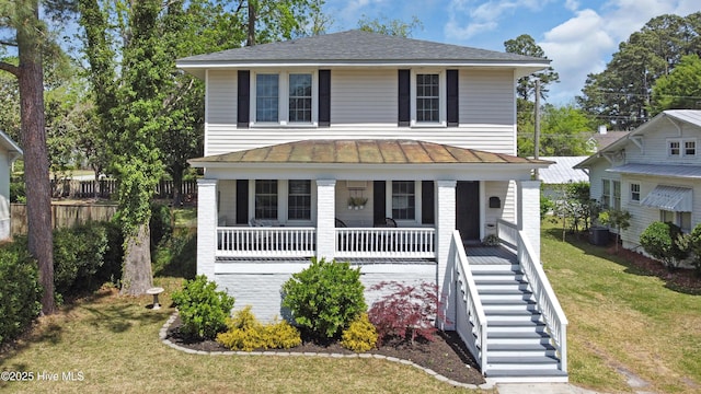 1508 Rhem Ave, New Bern, NC 28560 - traditional style home featuring covered porch, stairway, a standing seam roof, and a front lawn
