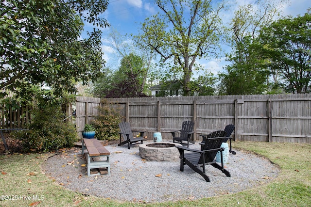 1508 Rhem Ave, New Bern, NC 28560 - view of patio with a fenced backyard and an outdoor fire pit