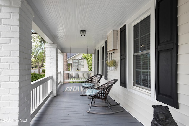 1508 Rhem Ave, New Bern, NC 28560 - wooden deck featuring covered porch