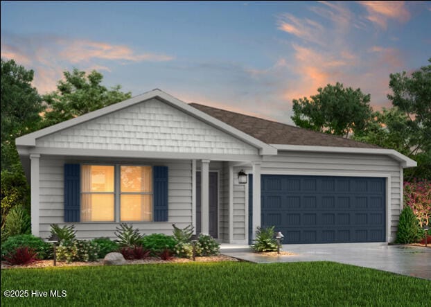 612 N Caswell St, La Grange, NC 28551 - single story home with a front yard, driveway, and a garage