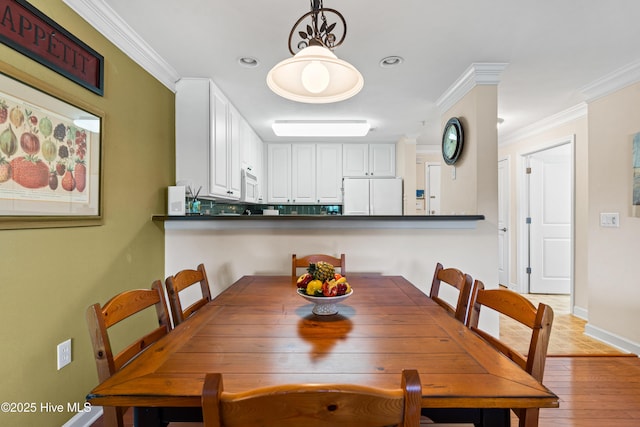 260 S Crow Creek Dr NW Lot 19, Calabash, NC 28467 - dining room featuring recessed lighting, baseboards, crown molding, and light wood-style flooring