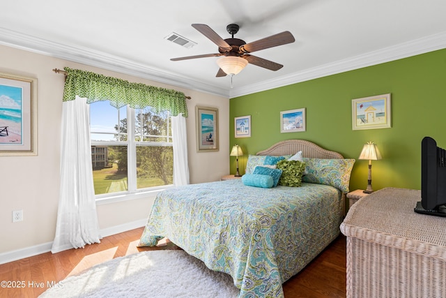 260 S Crow Creek Dr NW Lot 19, Calabash, NC 28467 - bedroom with baseboards, visible vents, a ceiling fan, wood finished floors, and ornamental molding