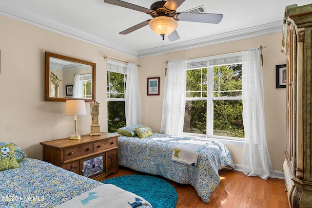 260 S Crow Creek Dr NW Lot 19, Calabash, NC 28467 - bedroom featuring hardwood / wood-style flooring, visible vents, a ceiling fan, and crown molding