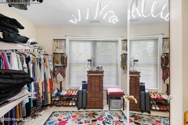 walk in closet featuring visible vents