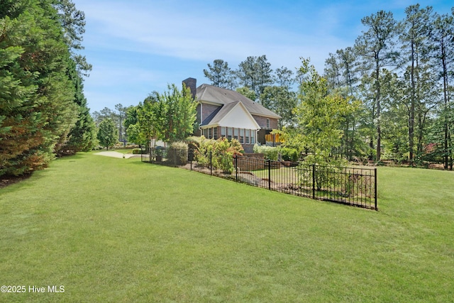 view of yard with fence