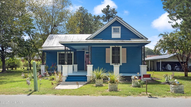 104 W Trent St, Trenton, NC 28585 - view of front of home featuring a porch and a front yard