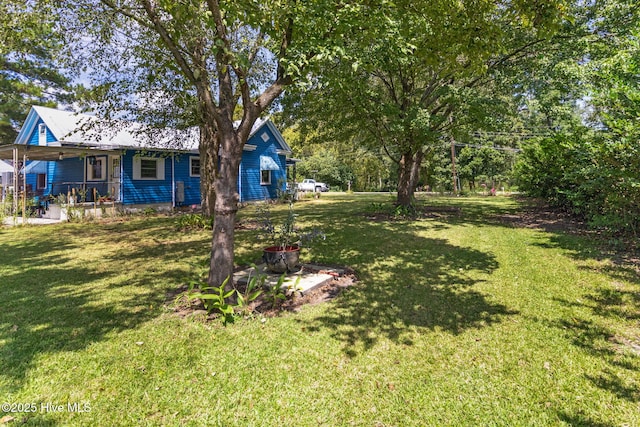 104 W Trent St, Trenton, NC 28585 - view of green lawn featuring covered porch