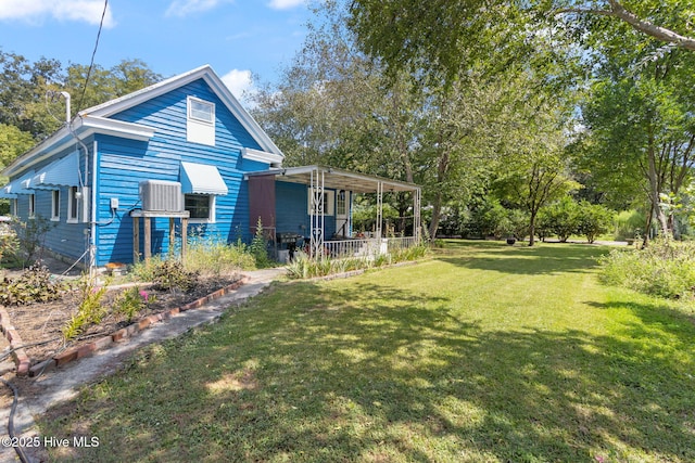 104 W Trent St, Trenton, NC 28585 - rear view of property with a yard and central AC