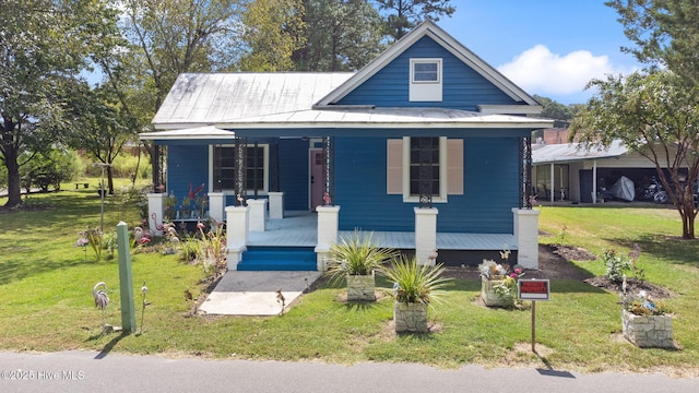 104 W Trent St, Trenton, NC 28585 - bungalow featuring covered porch and a front lawn