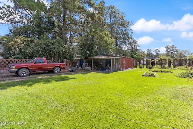 104 W Trent St, Trenton, NC 28585 - view of green lawn with an outbuilding and an outdoor structure